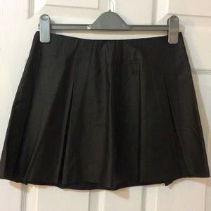 Pleated faux leather skater skirt.